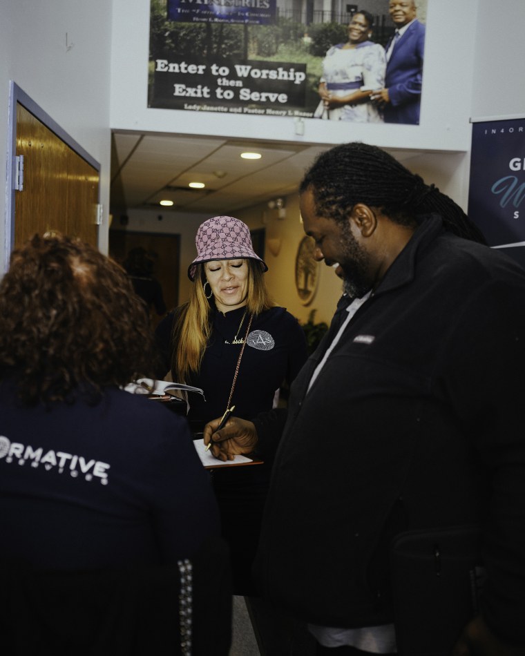 Jessica Grooms, In4ormative team member at church crypto event.