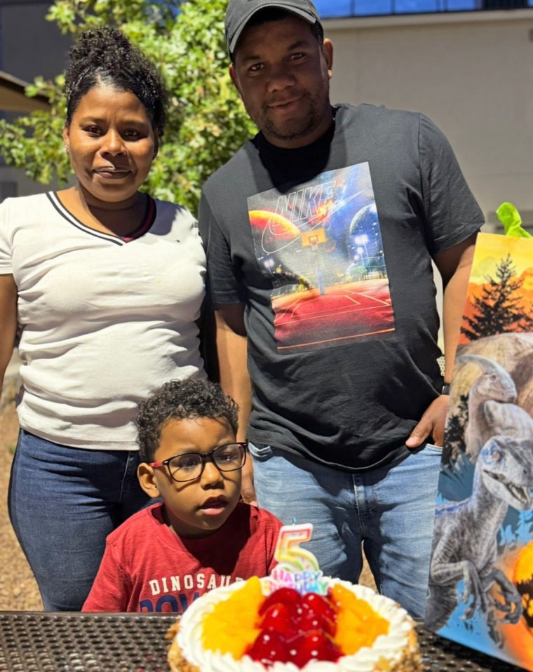 Gael with his parents.