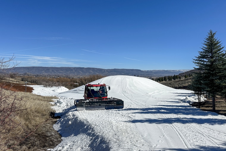 Snowcat at Soldier Hollow Nordic Center is used to help build the snow preservation pile.