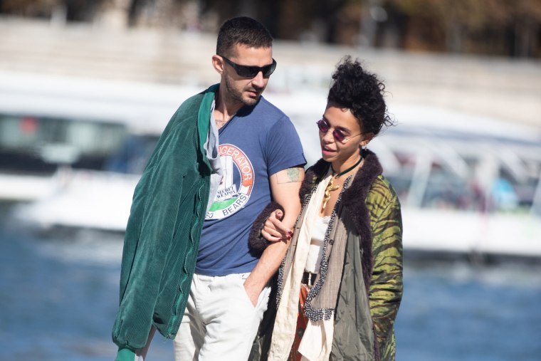 Shia LaBeouf and FKA Twigs walk along the Seine in Paris in 2018.