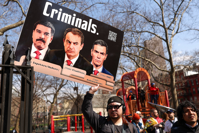 People protest Maduro.