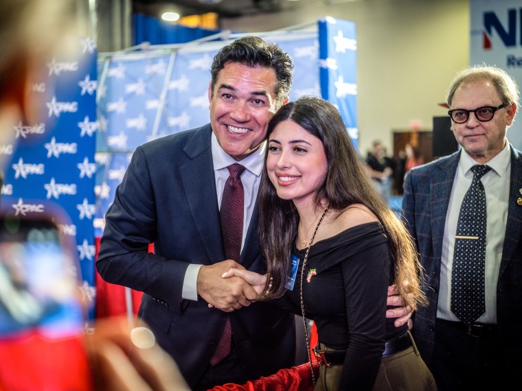 Former television actor Dean Cain posing with an attendee on Thursday.