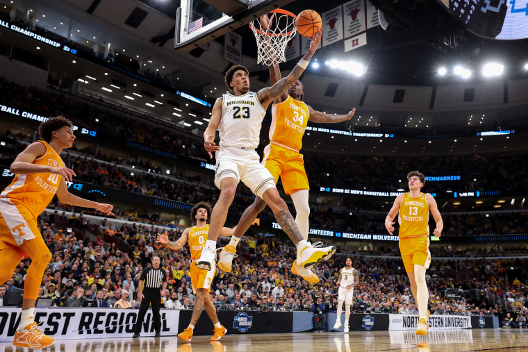 on-court action during an NCAA men's basketball game.