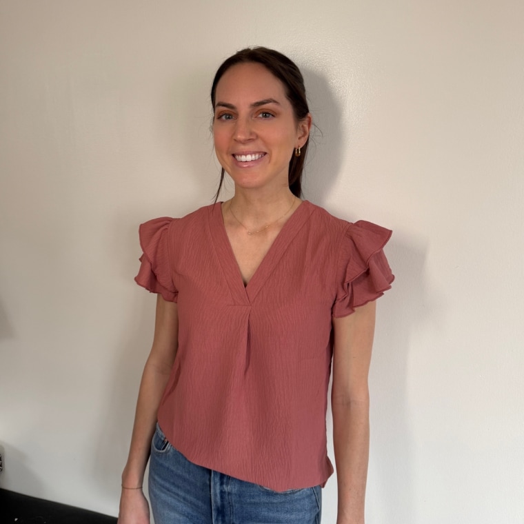 Shop TODAY Commerce Editor & Producer Julie Ricevuto wearing the shirt in the "bean paste red" colorway.