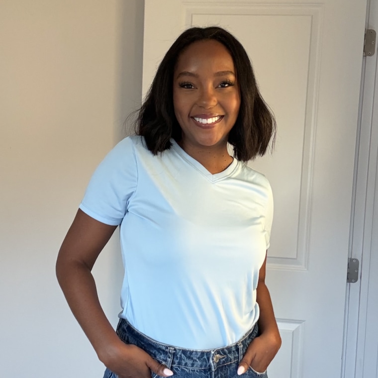 Shop TODAY contributor Makho Ndlovu models the Hanes Women's Sport Cool Dry V-Neck T-Shirt.