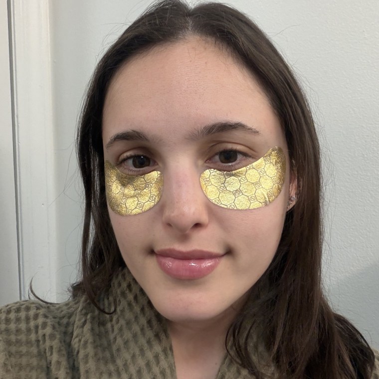 Woman wearing yellow under-eye masks