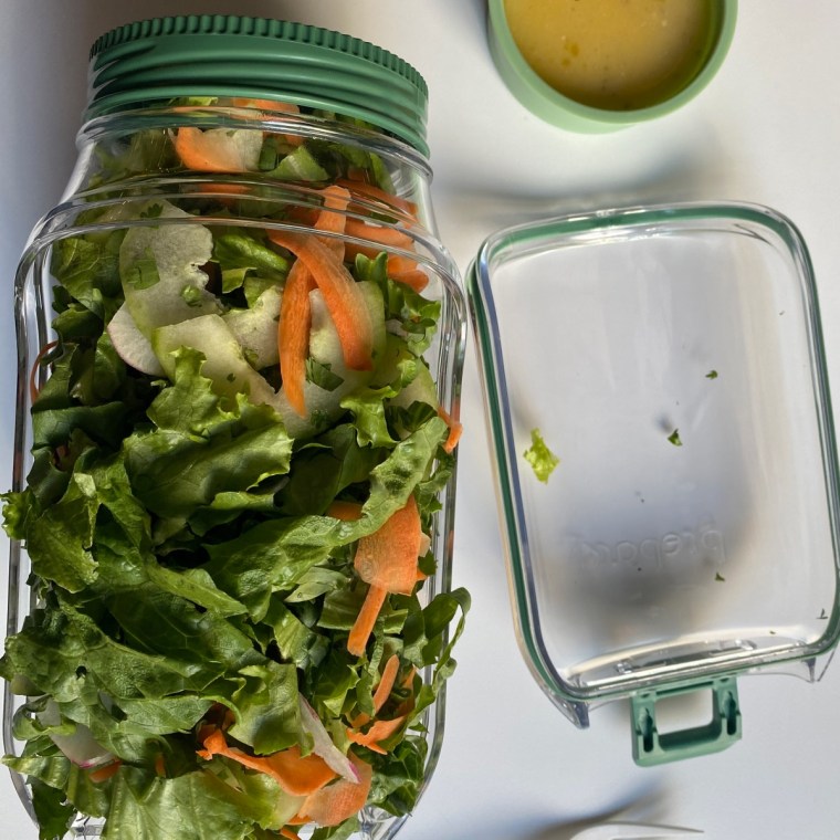 Image of Prapara the salad pod on a work table with a fork.