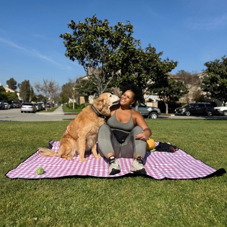 Start TODAY fitness and mindset coach Lacee Green (and her golden retriever!) enjoying a sunny day outside on the Zaze Extra Large Picnic Outdoor Blanket.