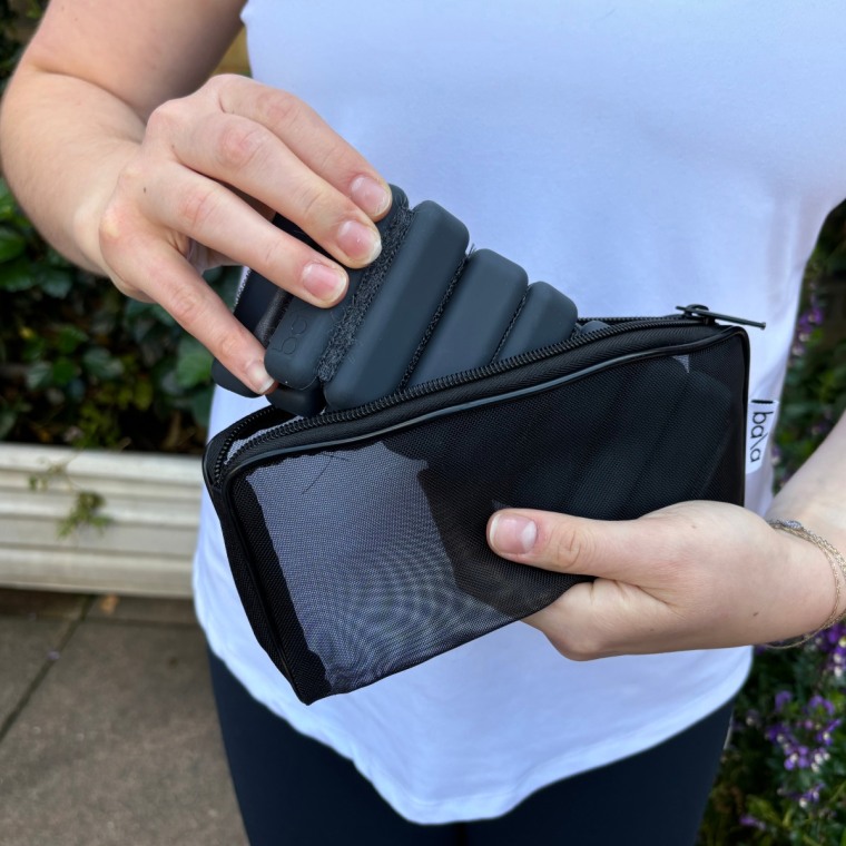 Each pair of Bala Bangles comes with a zippered mesh carrying case, which makes them easy to store and pack while I’m traveling.