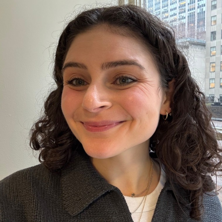 After of woman applied lip oil to her lips