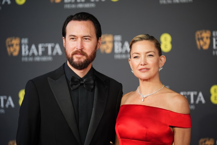 Danny Fujikawa and Kate Hudson at the 79th British Academy Film Awards on Feb. 21, 2026.