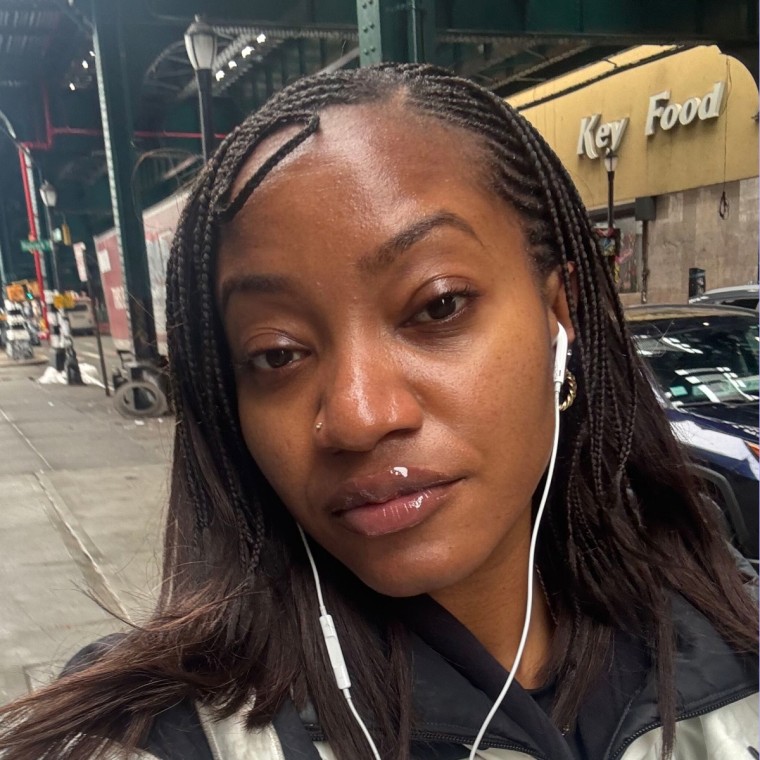 Woman wearing lip oil on lips