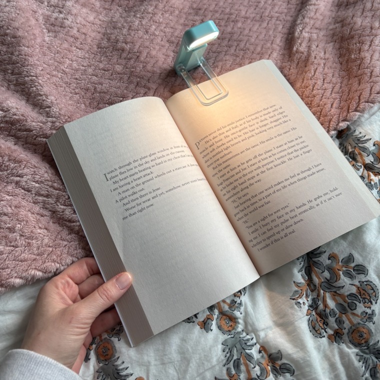 Glocusent Portable Clip-on LED Reading Light in use