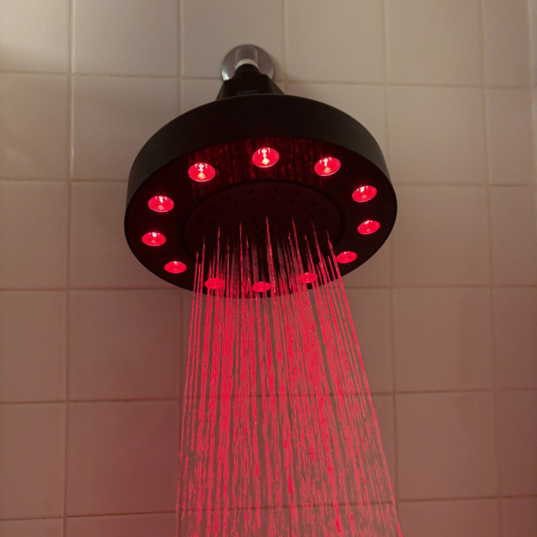 HigherDose’s Red Light Showerhead Filter installed in a bathroom.