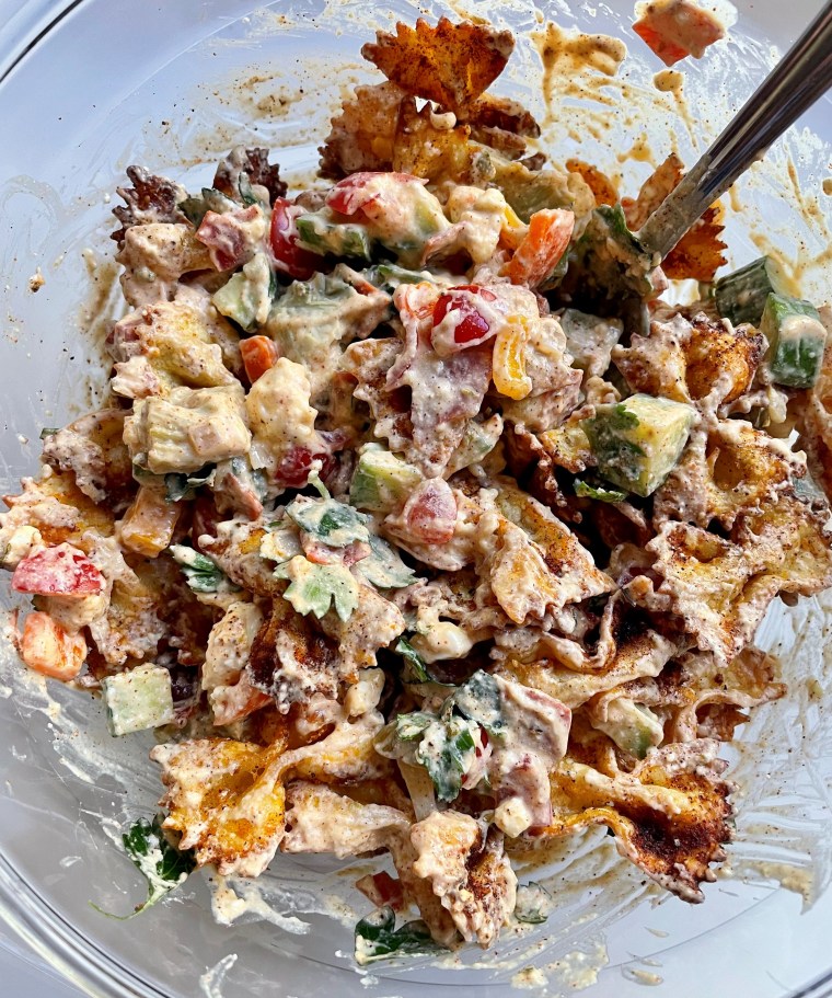 Pasta chips with chopped veggies and your favorite dressing makes a quick nutritious lunch.