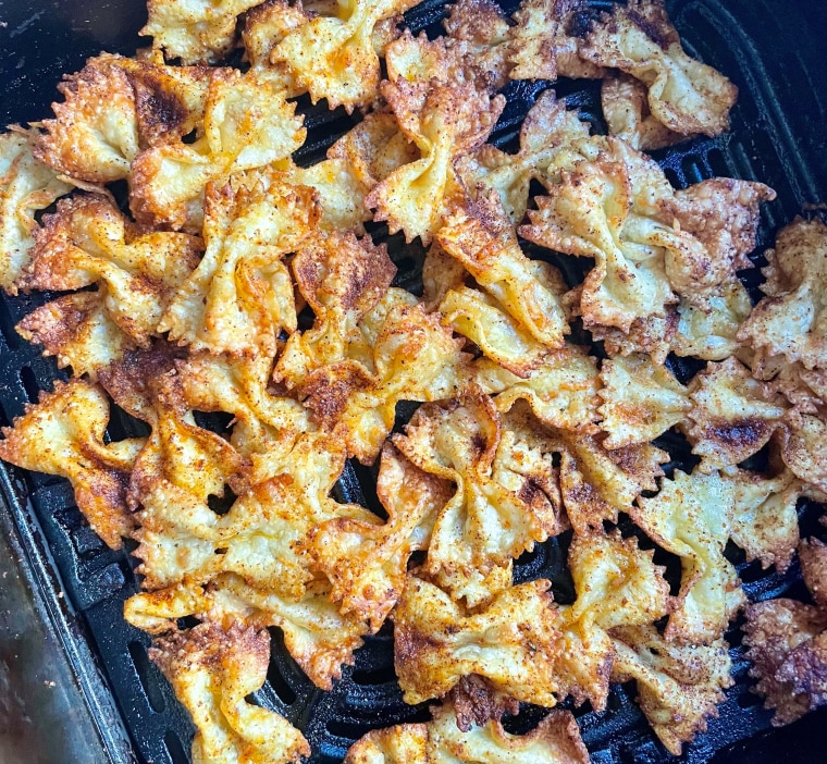 Par-cooked pasta with oil, spices and a little Parm is quick to crisp in the air fryer.