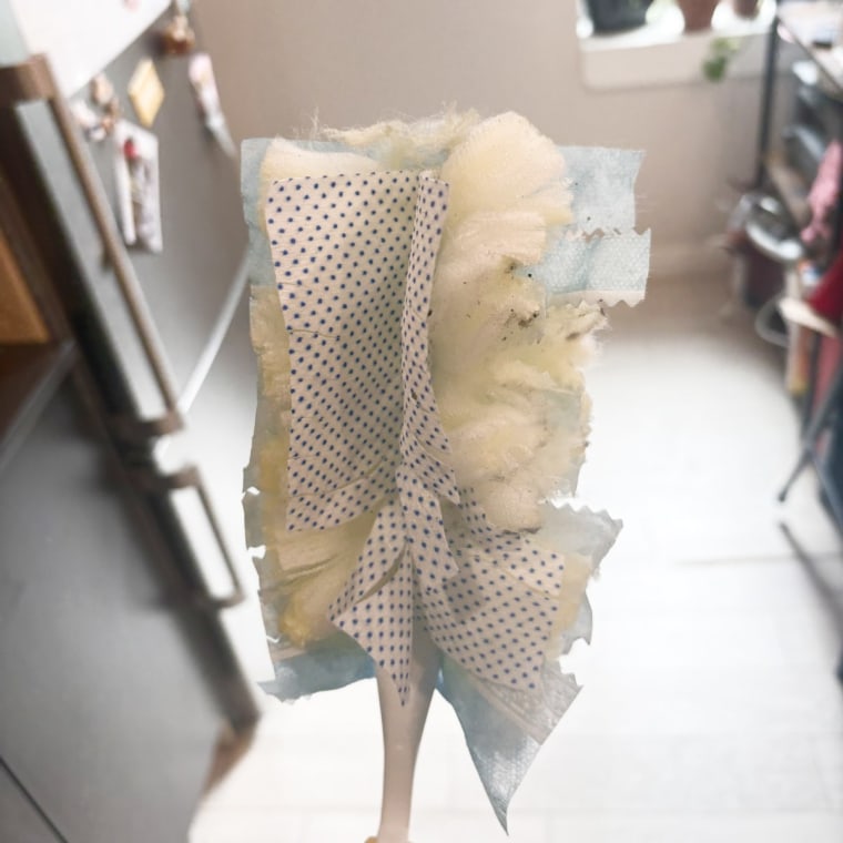 The dotted parts on this Swiffer duster are the coated fibers that the brand says are better at collecting small debris. 