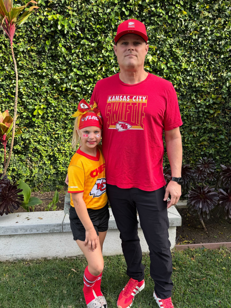 KC Swifties coach and his daughter, who goes by 'Karma' on the field.