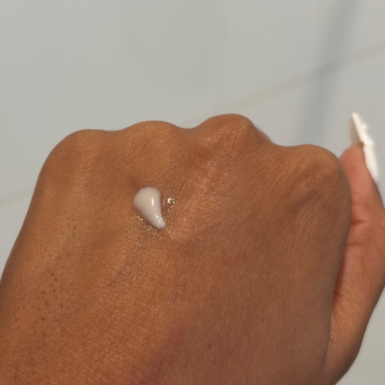 Woman with gel on back of hand