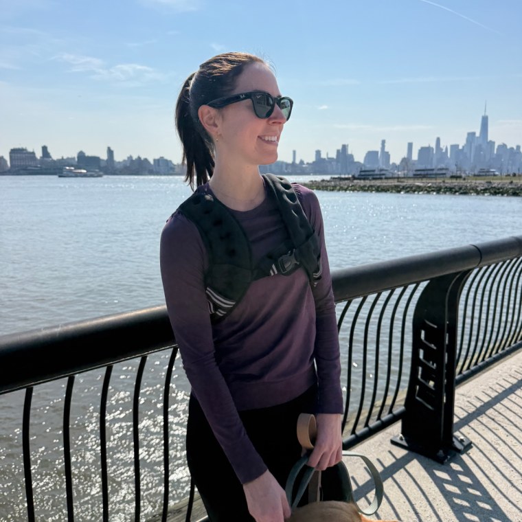 Shop TODAY Commerce Editor & Producer Julie Ricevuto  often wears the weighted vest while out walking her dog.