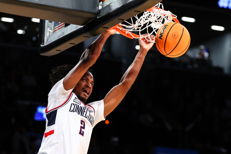 On-court action during an NCAA tournament game.