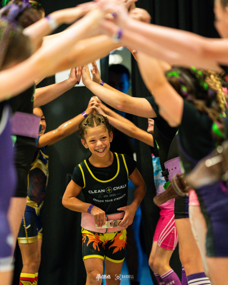 Lucy Milgrim and other youth lifters at the USA Powerlifting Youth Nationals.