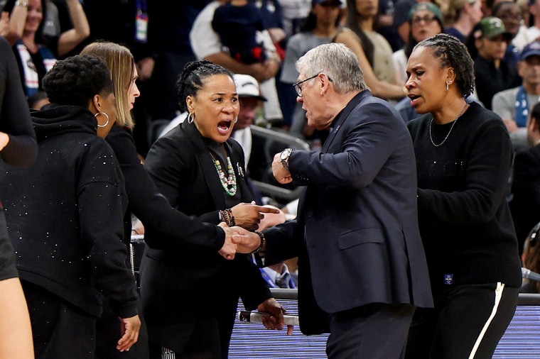 Dawn Staley of the South Carolina Gamecocks and head coach Geno Auriemma of the UConn Huskies.