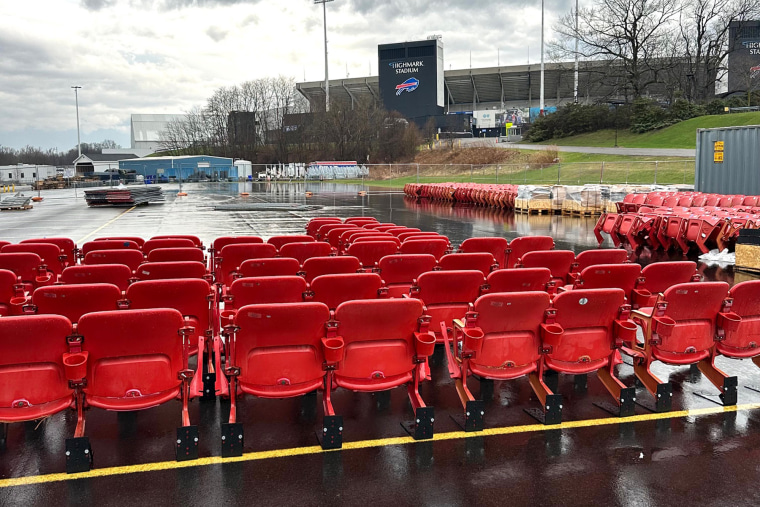 Seats outside the stadium.