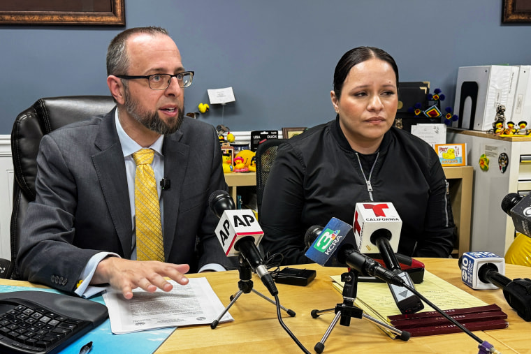 Patrick Kolasinski, attorney for Carlos Ivan Mendoza Hernandez, speaks at a news conference with his client's girlfriend, Cindy, on April 8, 2026, in Modesto, CA.