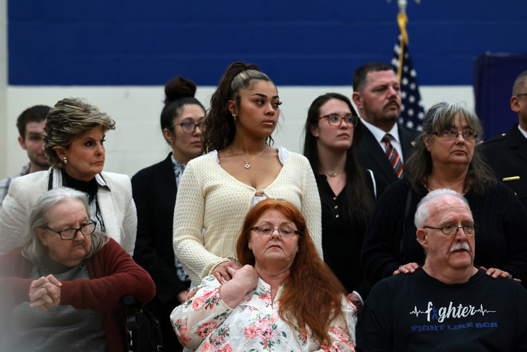 Elizabeth Baczkiel, left mother of Jessica Taylor, joins other family members of victims of the Gilgo Beach serial killer at Suffolk County Community College on April 8, 2026, in Brentwood, N.Y.