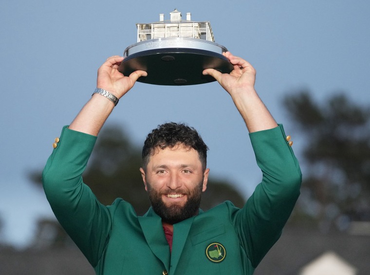 Jon Rahm of Spain holds up the Masters trophy