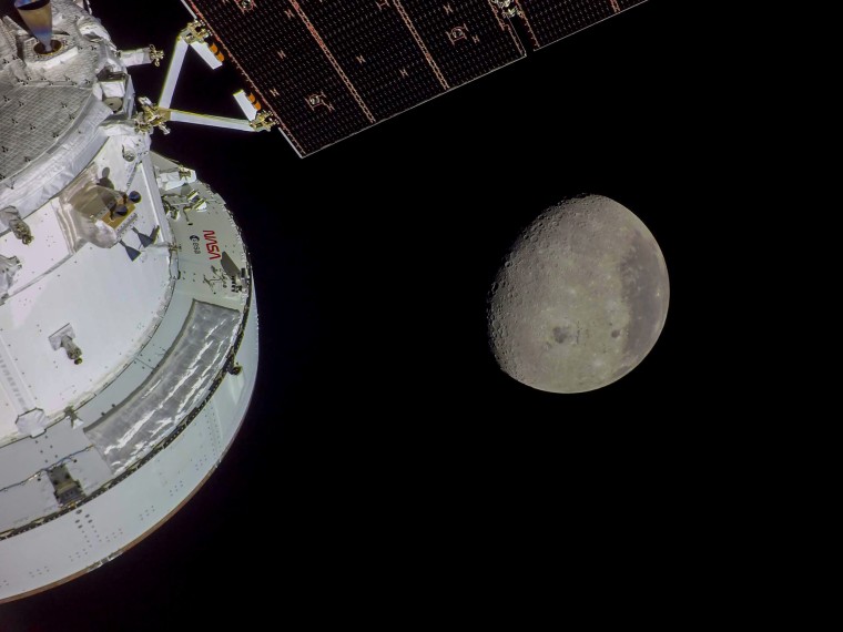  The Orion spacecraft is seen successful nan foreground lit up by nan Sun. A waxing gibbous Moon is visible successful nan background. Orientale basin, a 600-mile-wide effect crater ringed by mountains, is visible toward nan halfway bottommost of nan Moon. This basin straddles nan Moon’s adjacent and acold sides. To nan near of Orientale, which has a spot of ancient lava successful its basin, is nan acold side; this is nan hemisphere we don’t get to spot from Earth. To nan correct of Orientale is nan adjacent side, nan hemisphere we spot each time from Earth. The nearside is notable for giant, acheronian patches of ancient lave flows that screen its surface.