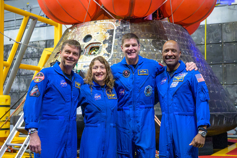 NASA astronauts Reid Wiseman, commander; left, Christina Koch, mission specialist; CSA (Canadian Space Agency) astronaut Jeremy Hansen, mission specialist; and NASA astronaut Victor Glover.