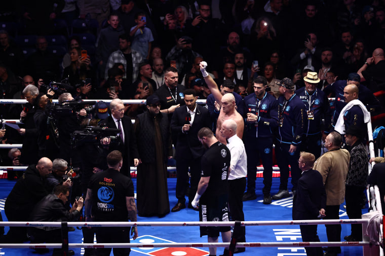 Britain's Tyson Fury celebrates after his victory over Russia's Arslanbek Makhmudov in their heavyweight 'Clash of the Giants' contest at the Tottenham Hotspur stadium on April 11.