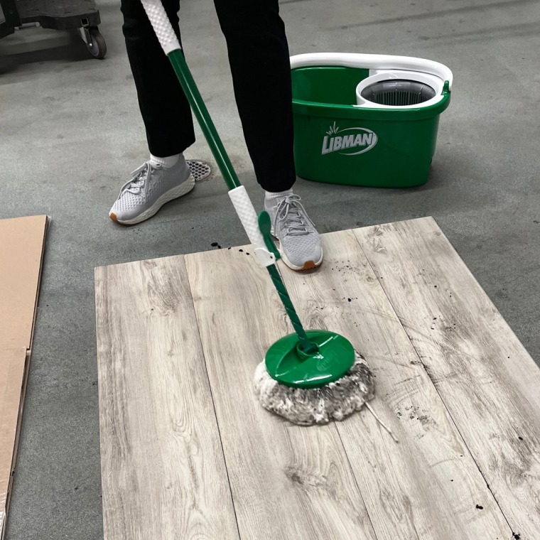 The microfiber-made mop head traps dirt and grime from the floor.