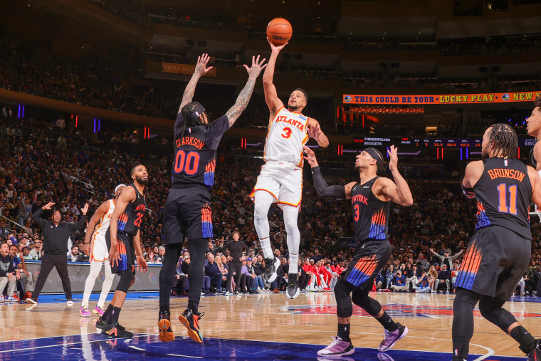 CJ McCollum of the Atlanta Hawks drives to the basket during the game against the New York Knicks