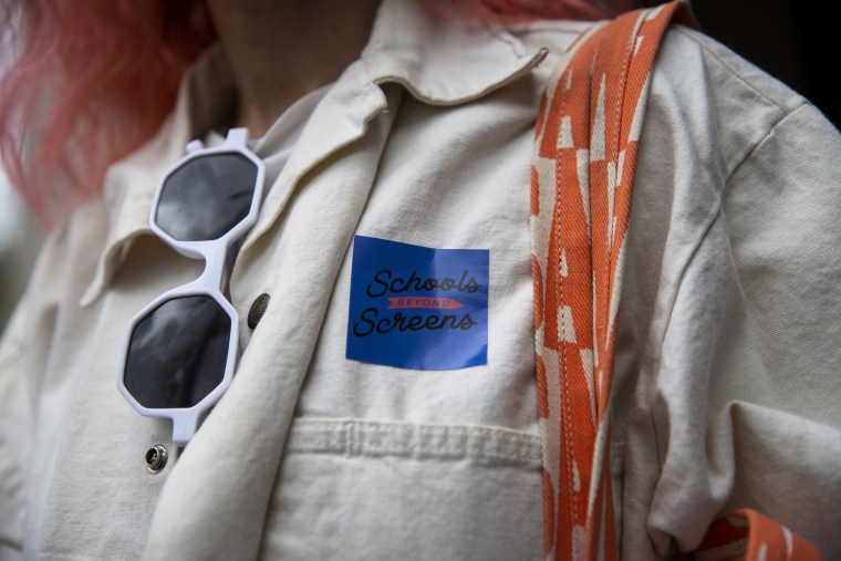 Supporters of School Beyond Screens attended the board meeting.