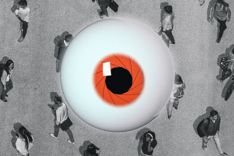 Illustration of an aerial of people walking on a street while a hyper-realistic eyeball with a camera-shutter iris watches over them.