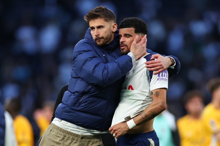 Goalkeeper Guglielmo Vicario comforts a dejected Dominic Solanke 