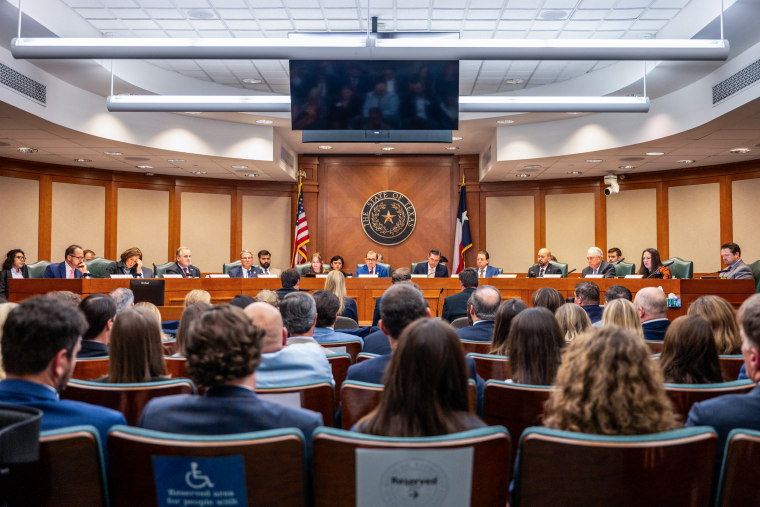 The Eastman family speak to legislators during a hearing on Camp Mystic at the Texas State Capitol. 