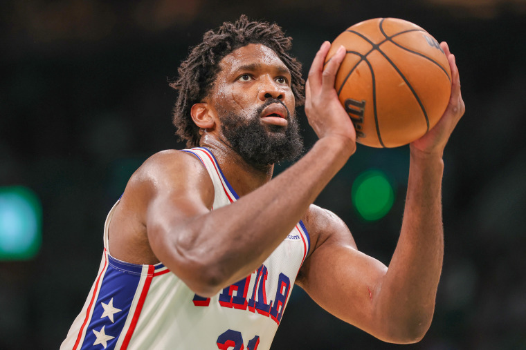 Joel Embiid of the Philadelphia 76ers attempts a free throw 