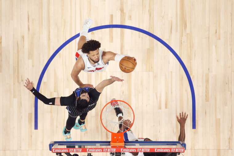 Cade Cunningham of the Detroit Pistons drives to the basket 