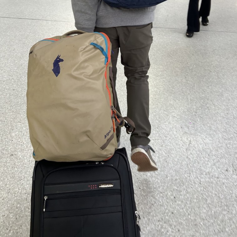 The trolley sleeve on the Cotopaxi backpack makes it easy to tote along with your luggage. 