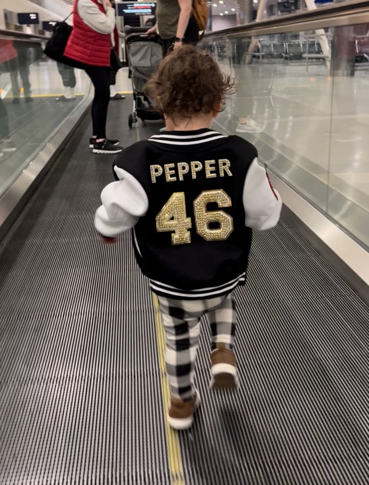 Wells Pepper on a people mover in the airport