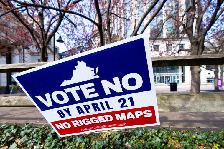Image: A sign urges early voters to vote no on the Virginia redistricting referendum