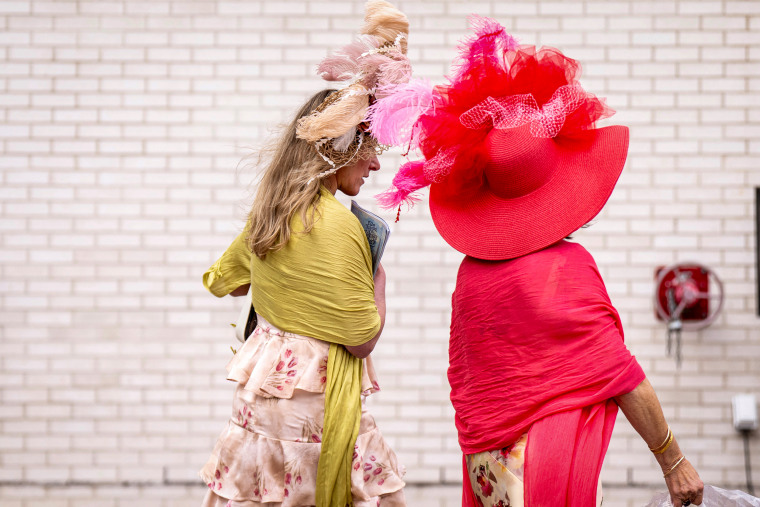 People wear Derby hats.