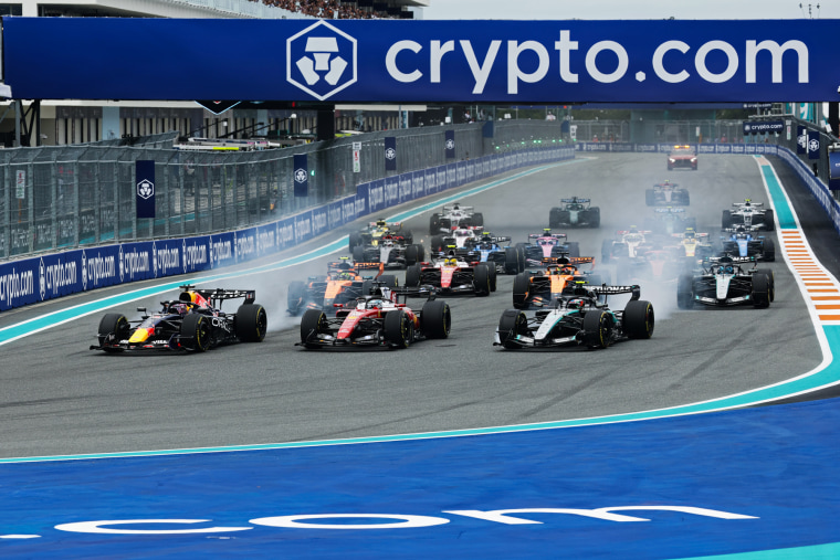 Wide view of cars on a racetrack