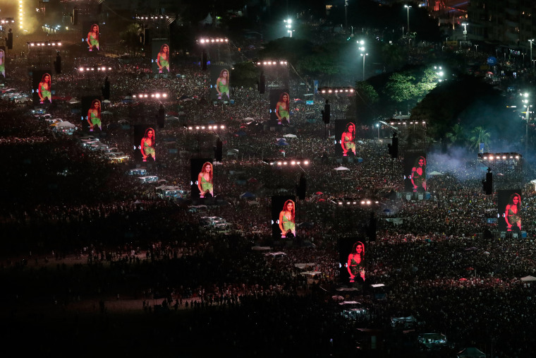 Fans pack the shores of Copacabana Beach to watch a free concert by Shakira in Rio de Janeiro, on Saturday, May 2.
