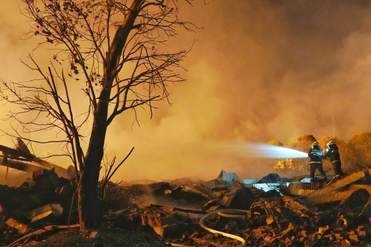 Fire rescue forces carry out rescue operations after an explosion at a fireworks plant in Hunan. China.