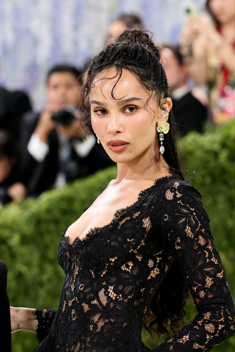 Zoe Kravitz in a lacy black gown.